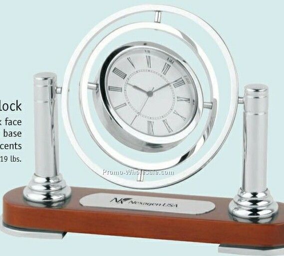 Rosewood Base Spin Clock W/ Silver Finish Brass Frame