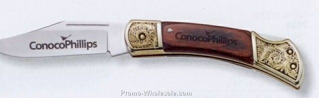 Dakota "little Woodsman" Pocket Knife With Filigree Bolsters